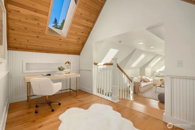 a view of a livingroom with furniture and windows