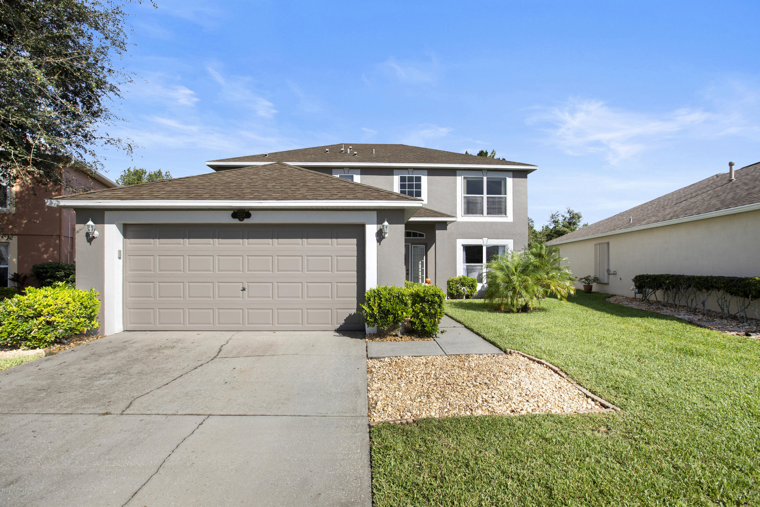 2228 Spring Creek Circle Palm Bay, FL 32905 - Photo 3 of 41 Front of house