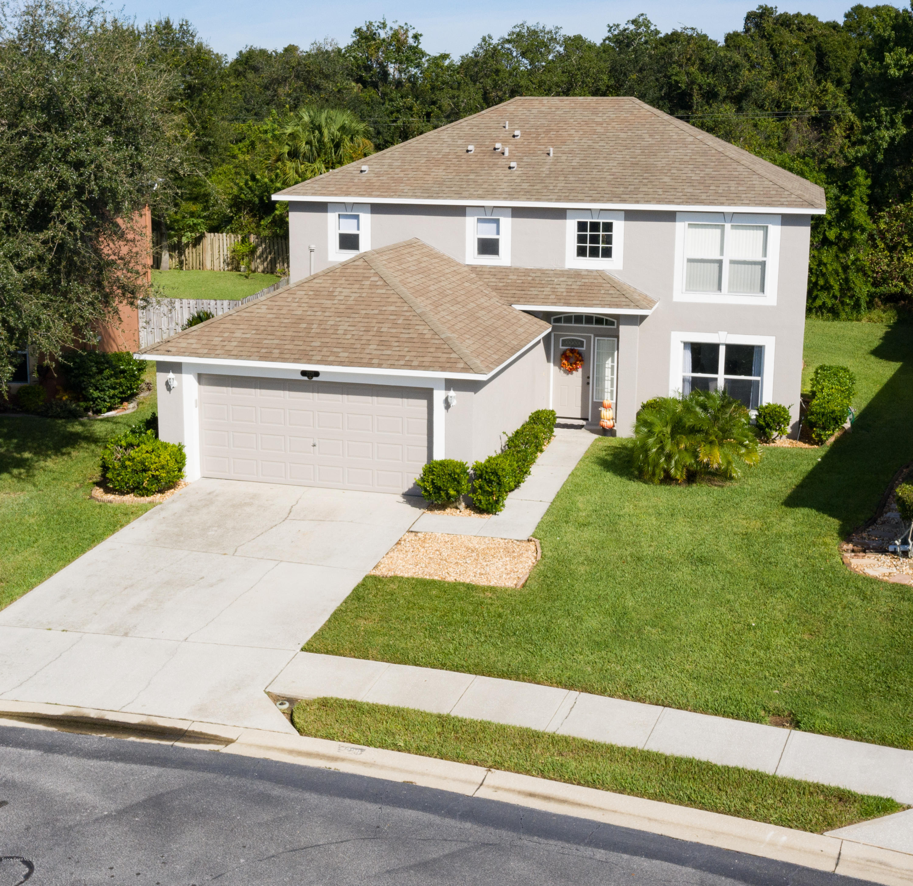 2228 Spring Creek Circle Palm Bay, FL 32905 - Photo 4 of 41 Aerial Front