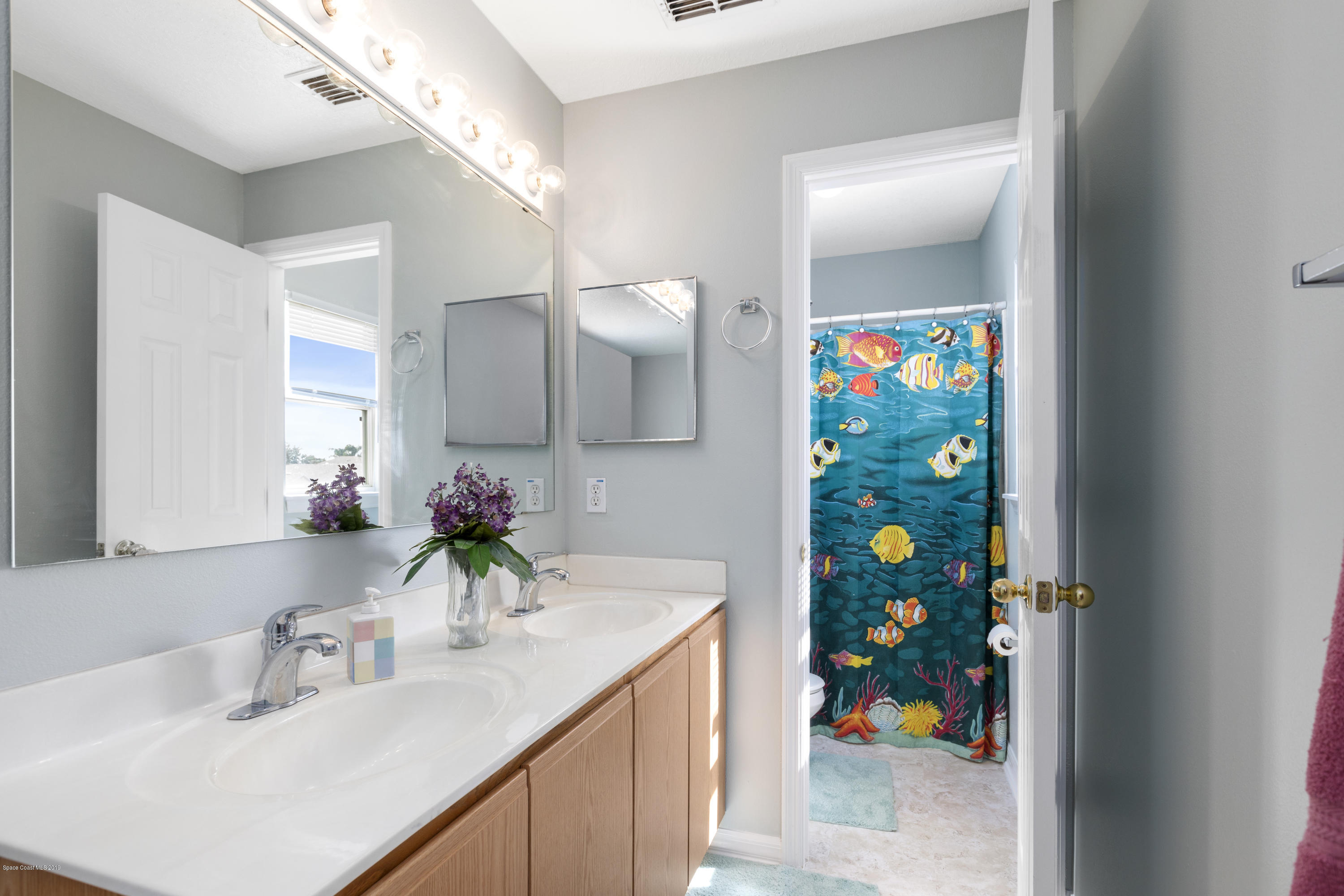 2228 Spring Creek Circle Palm Bay, FL 32905 - Photo 34 of 41 Baster Bathroom