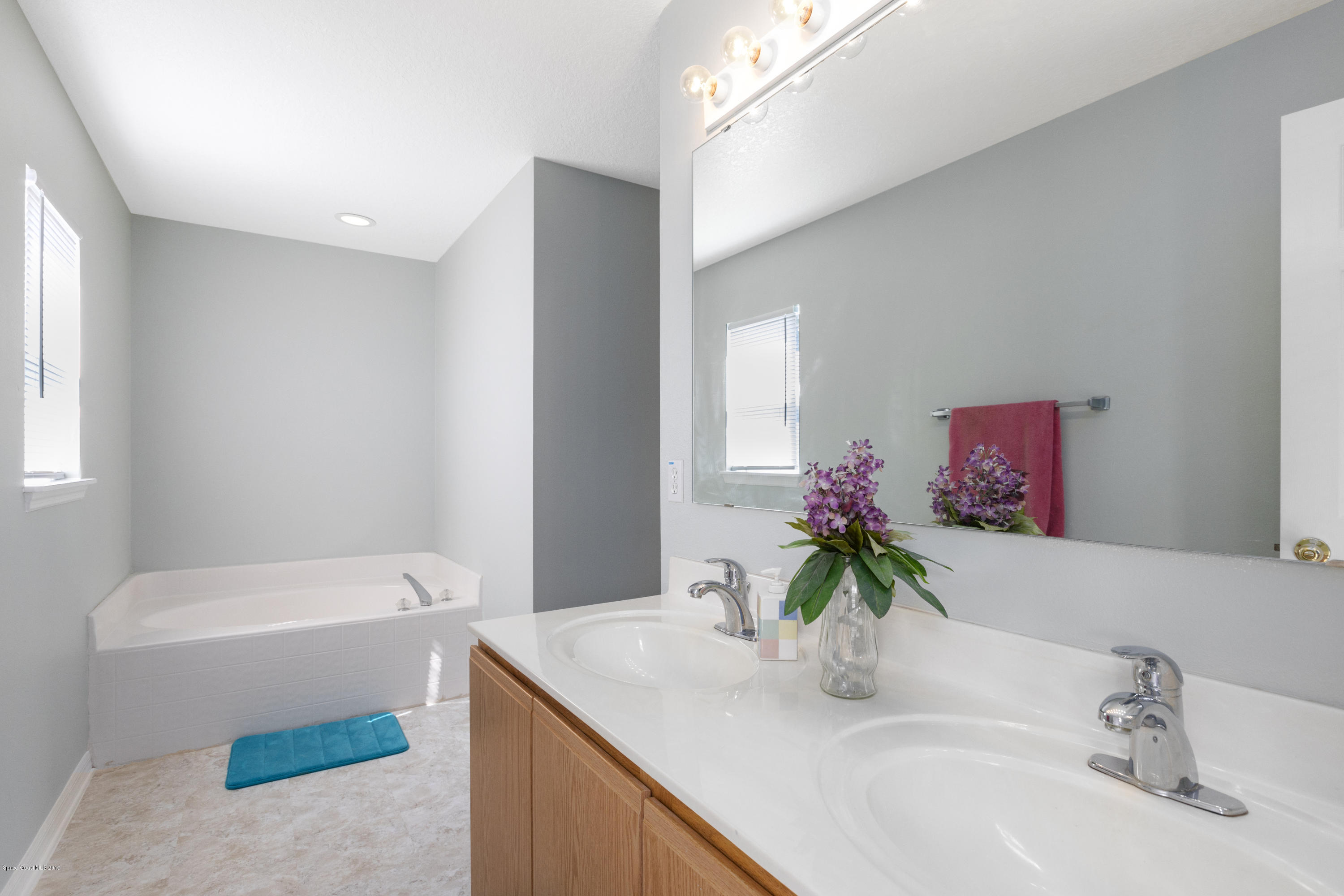 2228 Spring Creek Circle Palm Bay, FL 32905 - Photo 35 of 41 Baster Bathroom