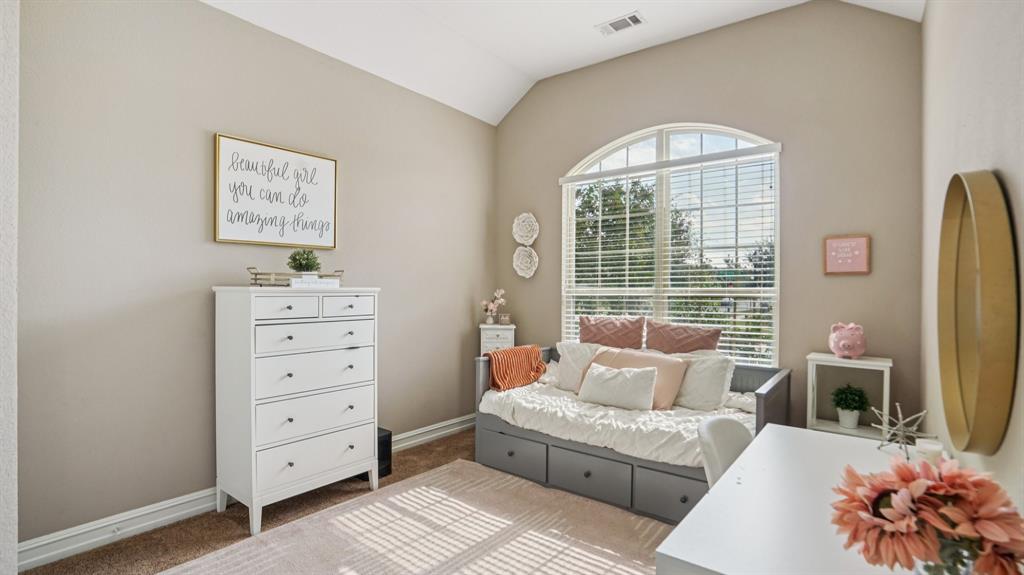 11192 Progreso Street Frisco, TX 75035 - Photo 13 of 30 a living room with furniture and a large window