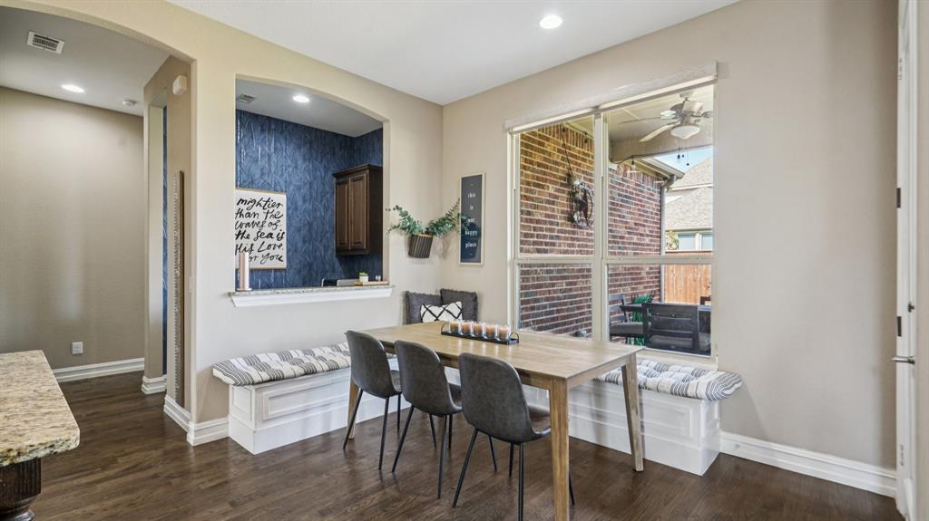 11192 Progreso Street Frisco, TX 75035 - Photo 8 of 30 a view of a dining room with furniture and wooden floor