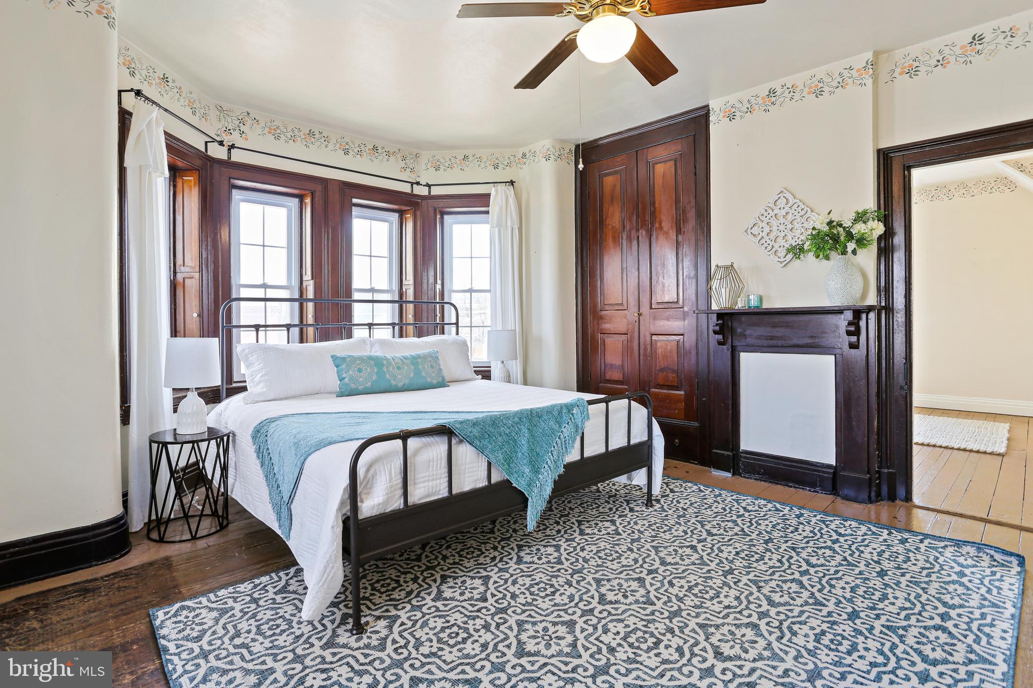 33 West Broadway Street Union Bridge, MD 21791 - Photo 23 of 31 a bed sitting in a spacious bedroom next to a window