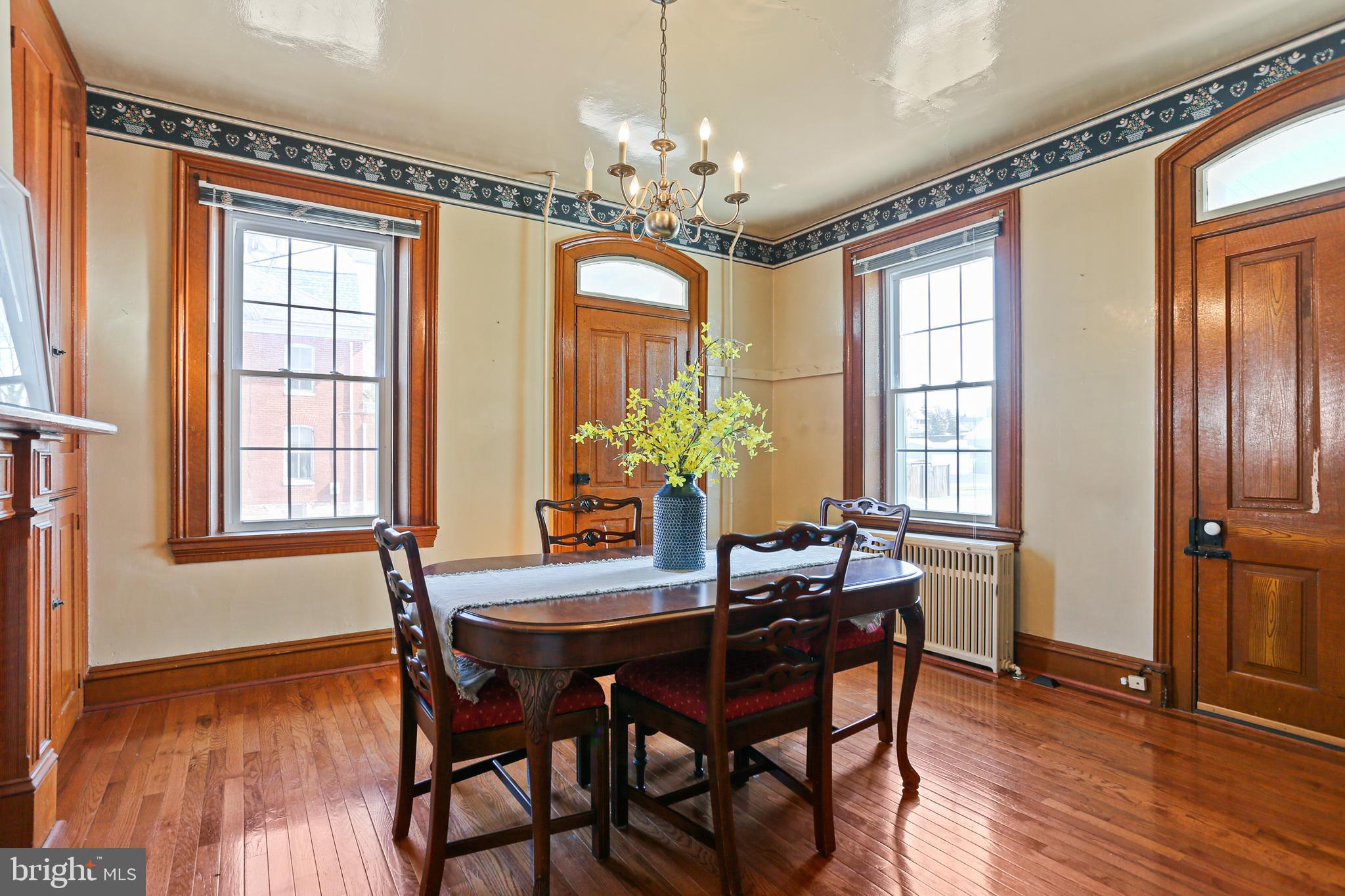 33 West Broadway Street Union Bridge, MD 21791 - Photo 8 of 31 a view of a dining room with furniture window and wooden floor