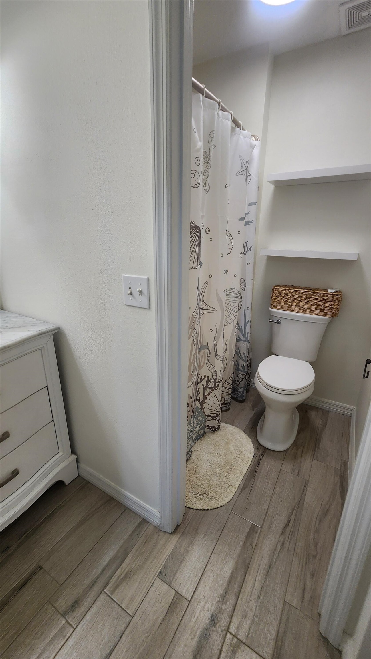 206 4th Street St. Augustine, FL 32080 - Photo 9 of 11 a bathroom with a toilet and a shower