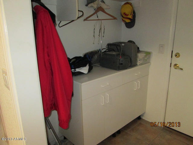 3225 East Fremont Road Phoenix, AZ 85042 - Photo 15 of 29 Laundry rm cabinets