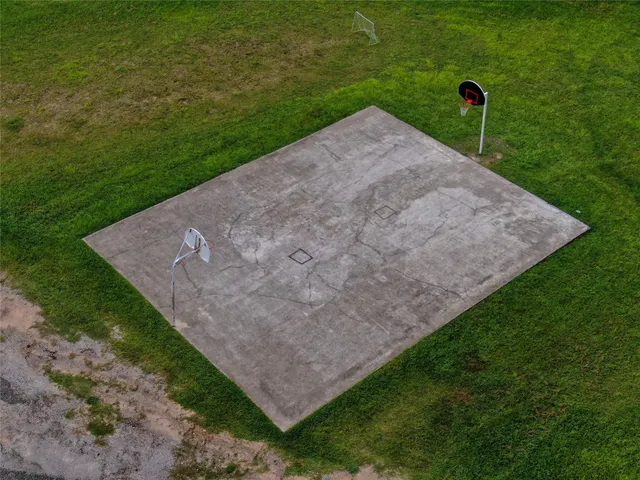 a black and white photo of a open kitchen