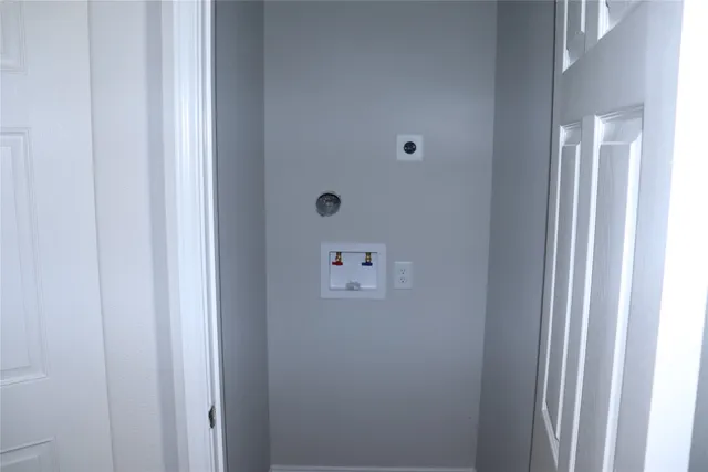 a view of a room that has a window in it