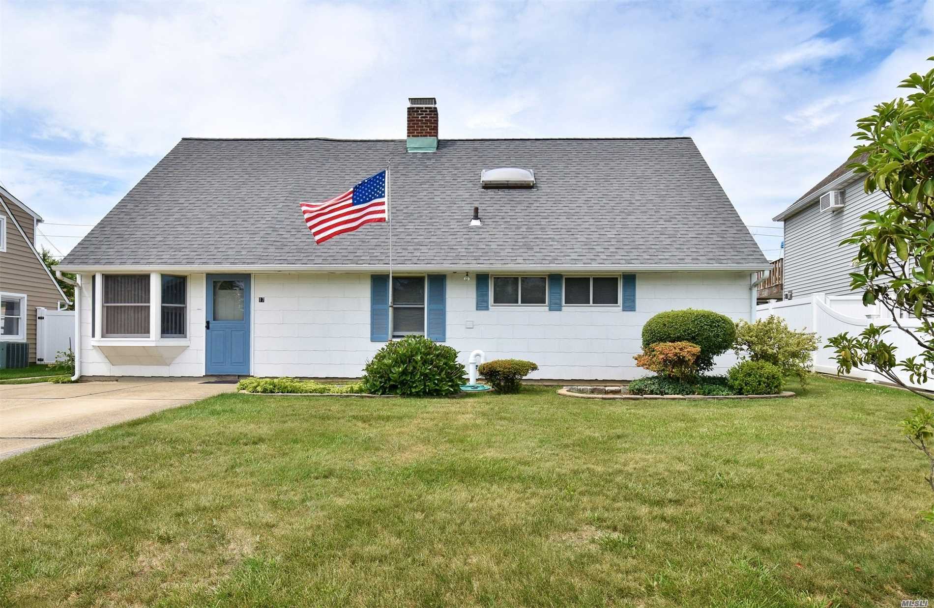 17 Constellation Road Levittown, NY 11756 - Photo 1 of 1 a front view of a house with garden