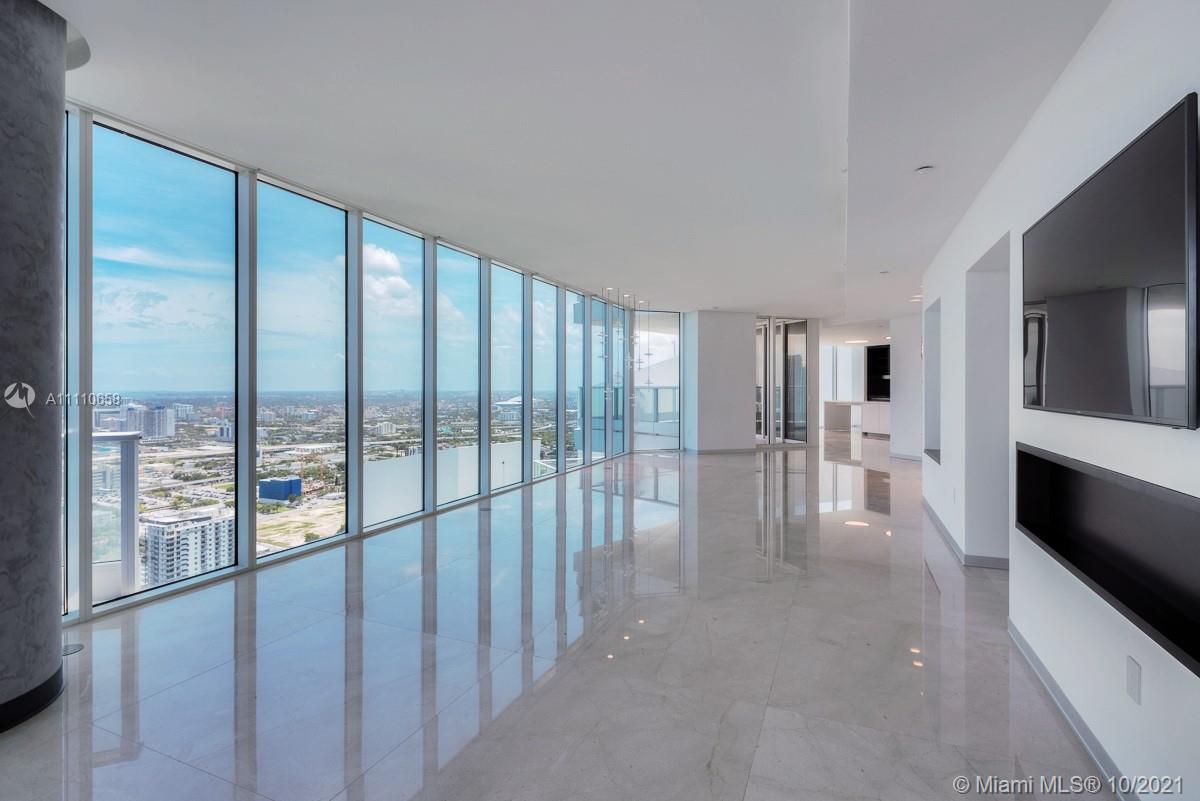Edgewater Miami, FL 33137 - Photo 11 of 42 a view of an entryway with wooden floor