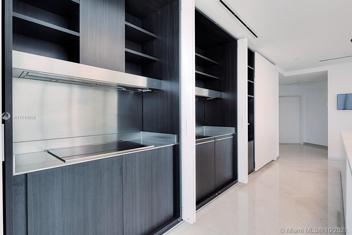 Edgewater Miami, FL 33137 - Photo 10 of 42 a view of walk in closet