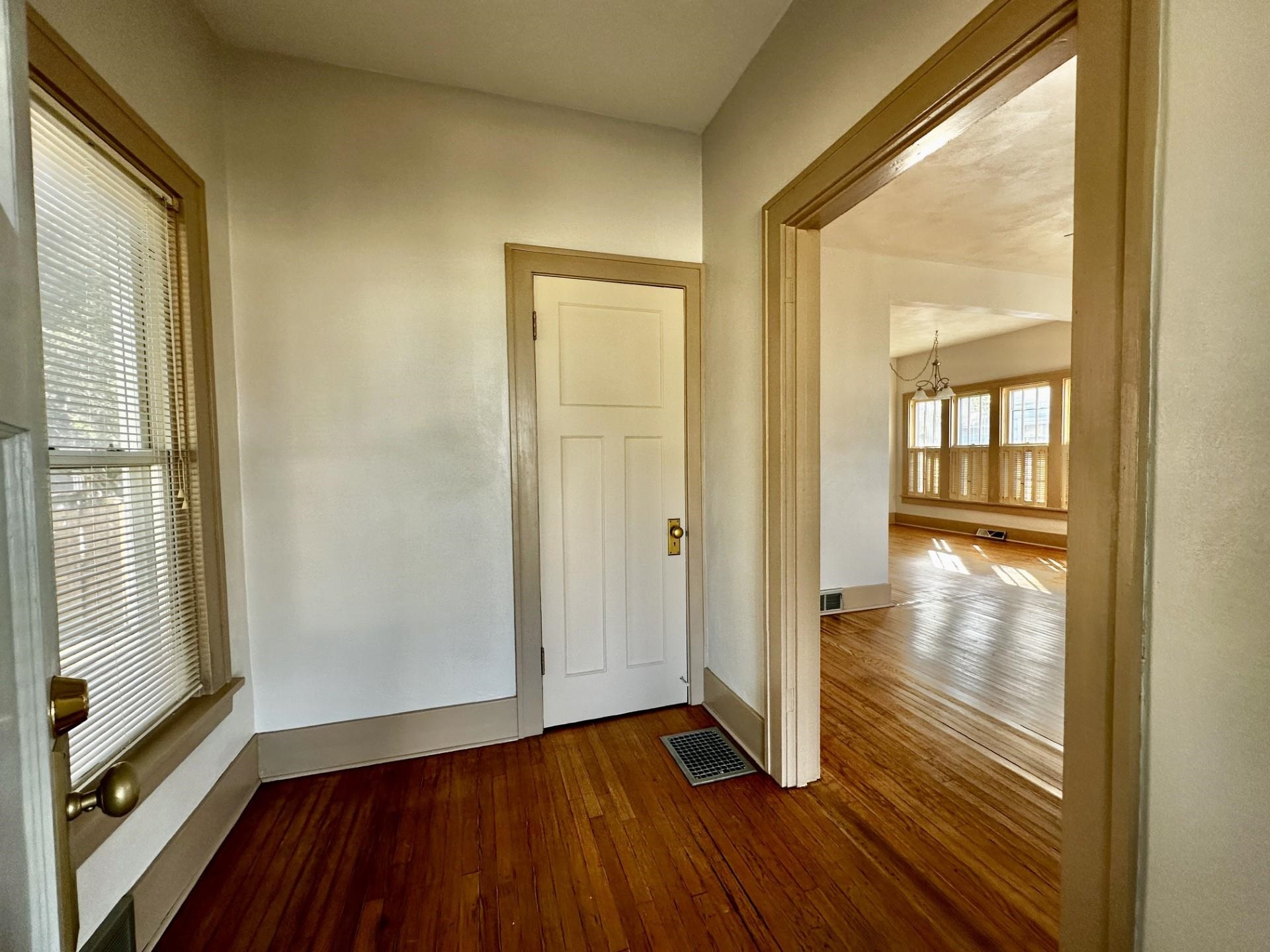 45 North Sunset Avenue Freeport, IL 61032 - Photo 2 of 23 a view of empty room with wooden floor and fan