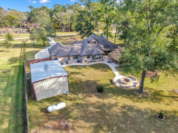 $699,000 | 11486 Oak Springs Drive, Willis, TX 77378
