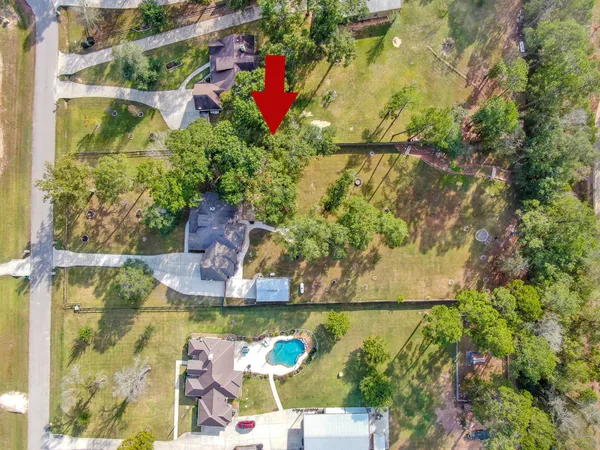 $699,000 | 11486 Oak Springs Drive, Willis, TX 77378