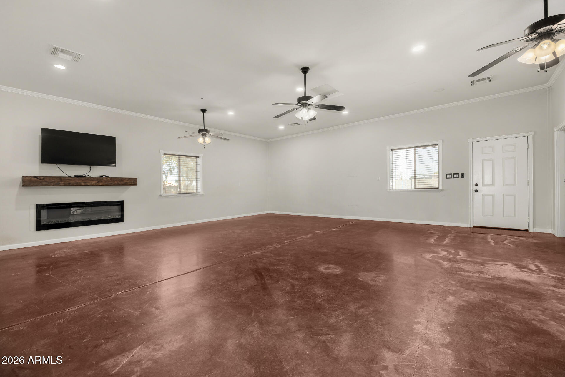 2266 East Willis Road Gilbert, AZ 85297 - Photo 3 of 15 a view of livingroom with hardwood floor and a ceiling fan