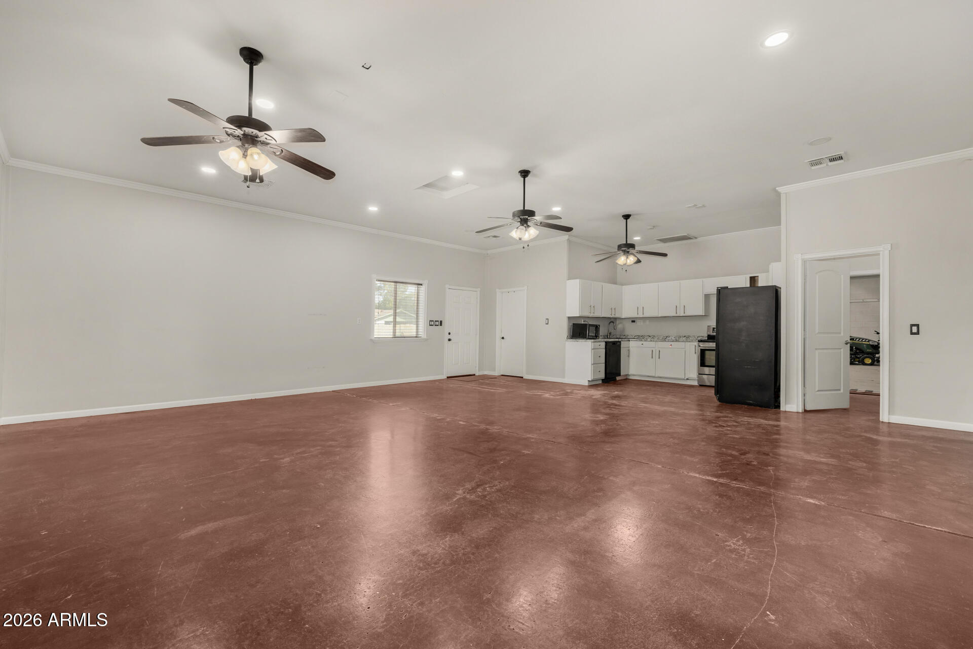 2266 East Willis Road Gilbert, AZ 85297 - Photo 4 of 15 a view of empty room with a kitchen