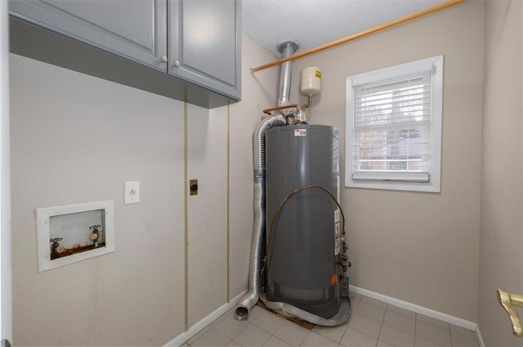 5498 Smoke Rise Drive Smoke Rise, GA 30087 - Photo 23 of 52 a room with window and closet