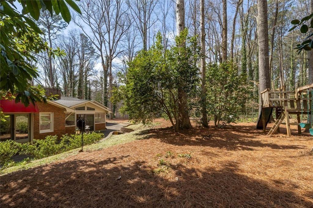 5498 Smoke Rise Drive Smoke Rise, GA 30087 - Photo 38 of 52 a view of a town with trees