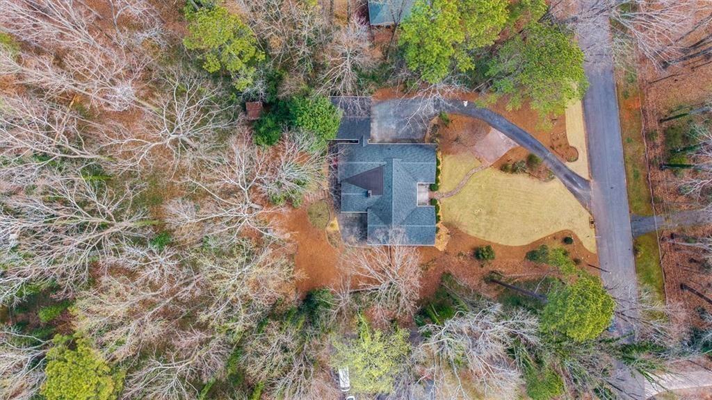 5498 Smoke Rise Drive Smoke Rise, GA 30087 - Photo 4 of 52 an aerial view of a house with outdoor space