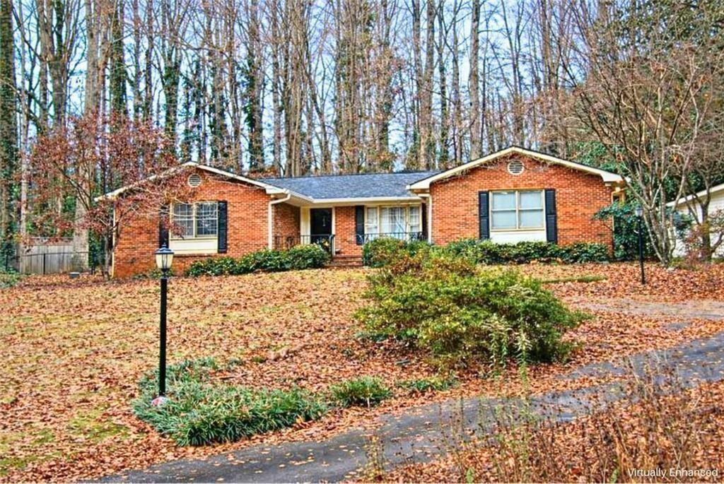 5498 Smoke Rise Drive Smoke Rise, GA 30087 - Photo 43 of 52 a front view of a house with a yard