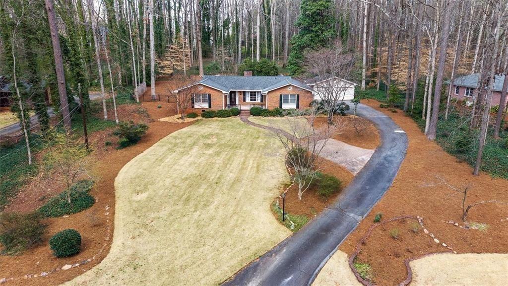5498 Smoke Rise Drive Smoke Rise, GA 30087 - Photo 45 of 52 a view of swimming pool with a patio