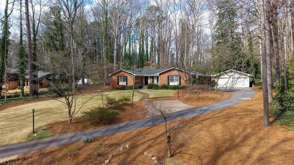 5498 Smoke Rise Drive Smoke Rise, GA 30087 - Photo 47 of 52 a view of yard with tree s