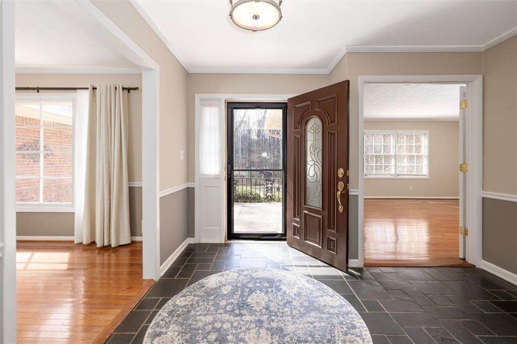 5498 Smoke Rise Drive Smoke Rise, GA 30087 - Photo 7 of 52 a view of a room with a large window