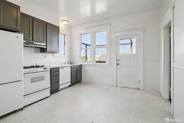 an empty room with wooden floor