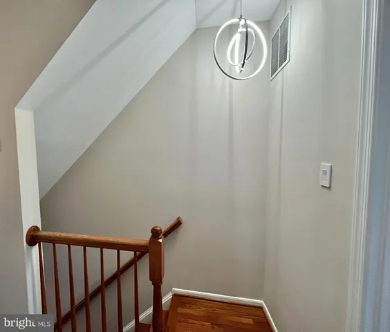 a bathroom with a sink and a window