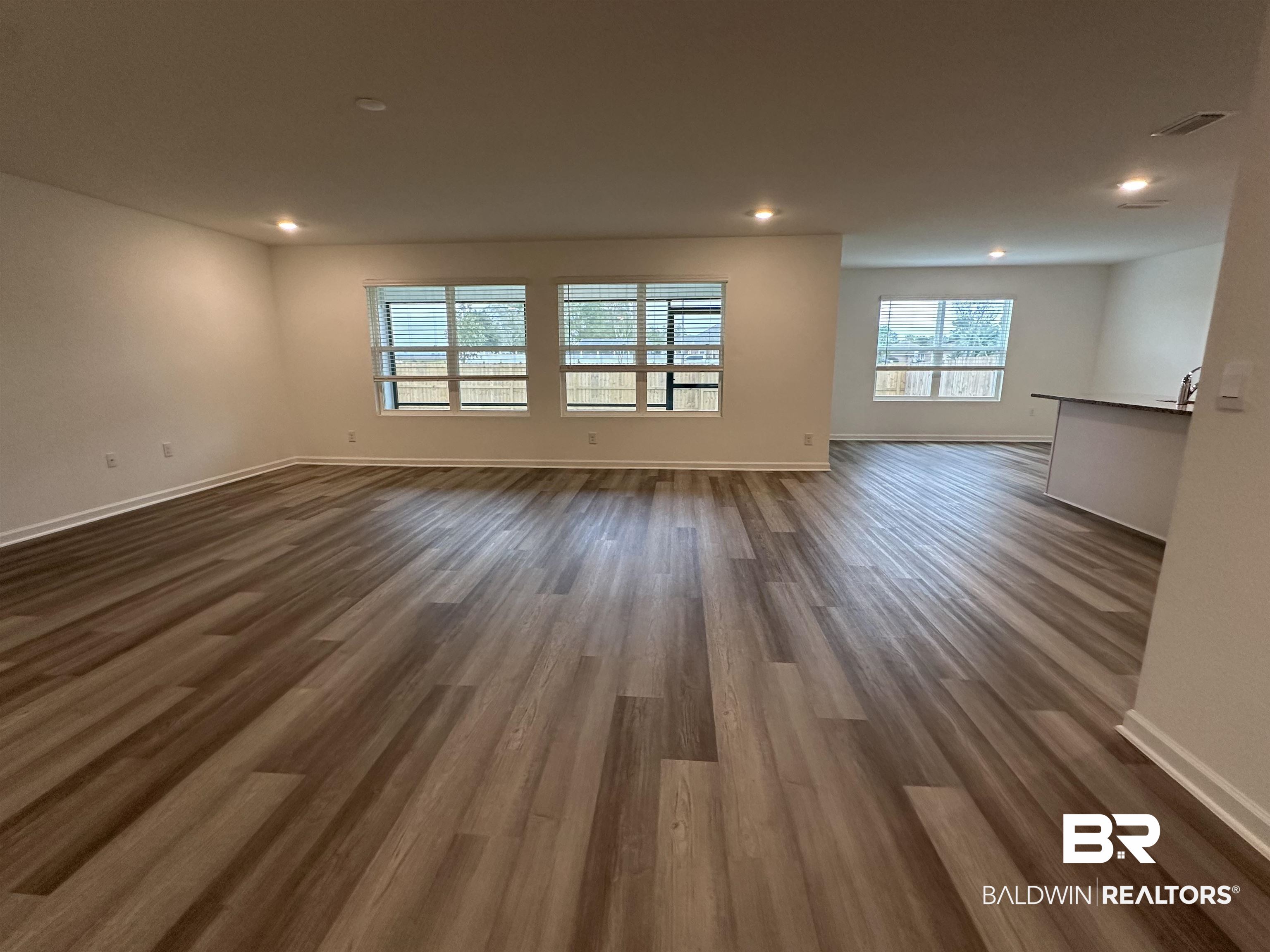 22275 Aleutian Avenue Foley, AL 36535 - Photo 11 of 72 Spare room with dark wood-type flooring