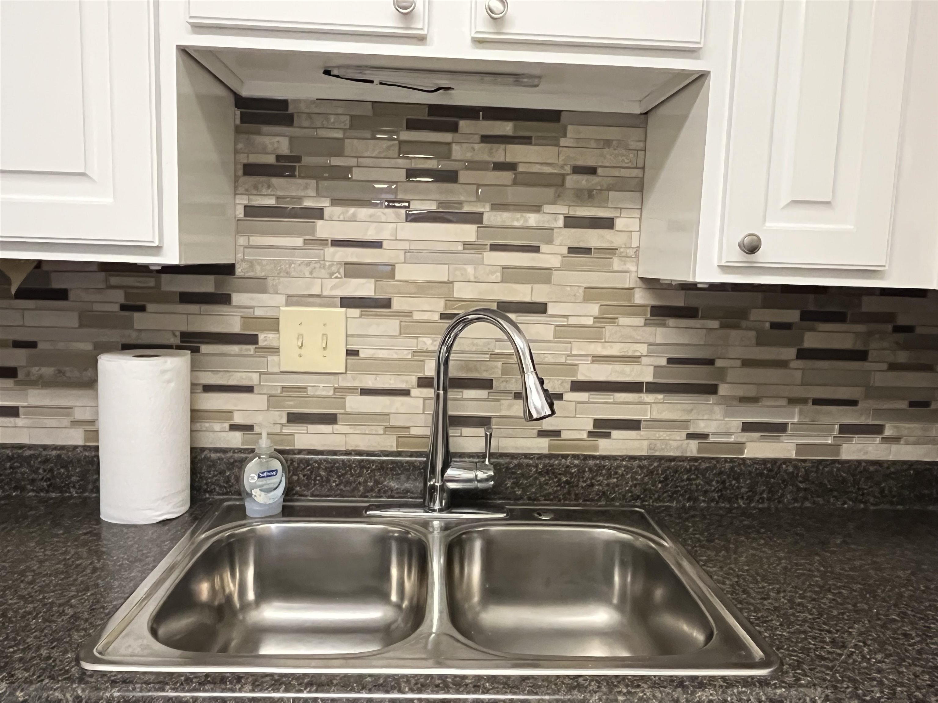 6960 Country Road Germantown, TN 38138 - Photo 14 of 36 a close view of sink and tap