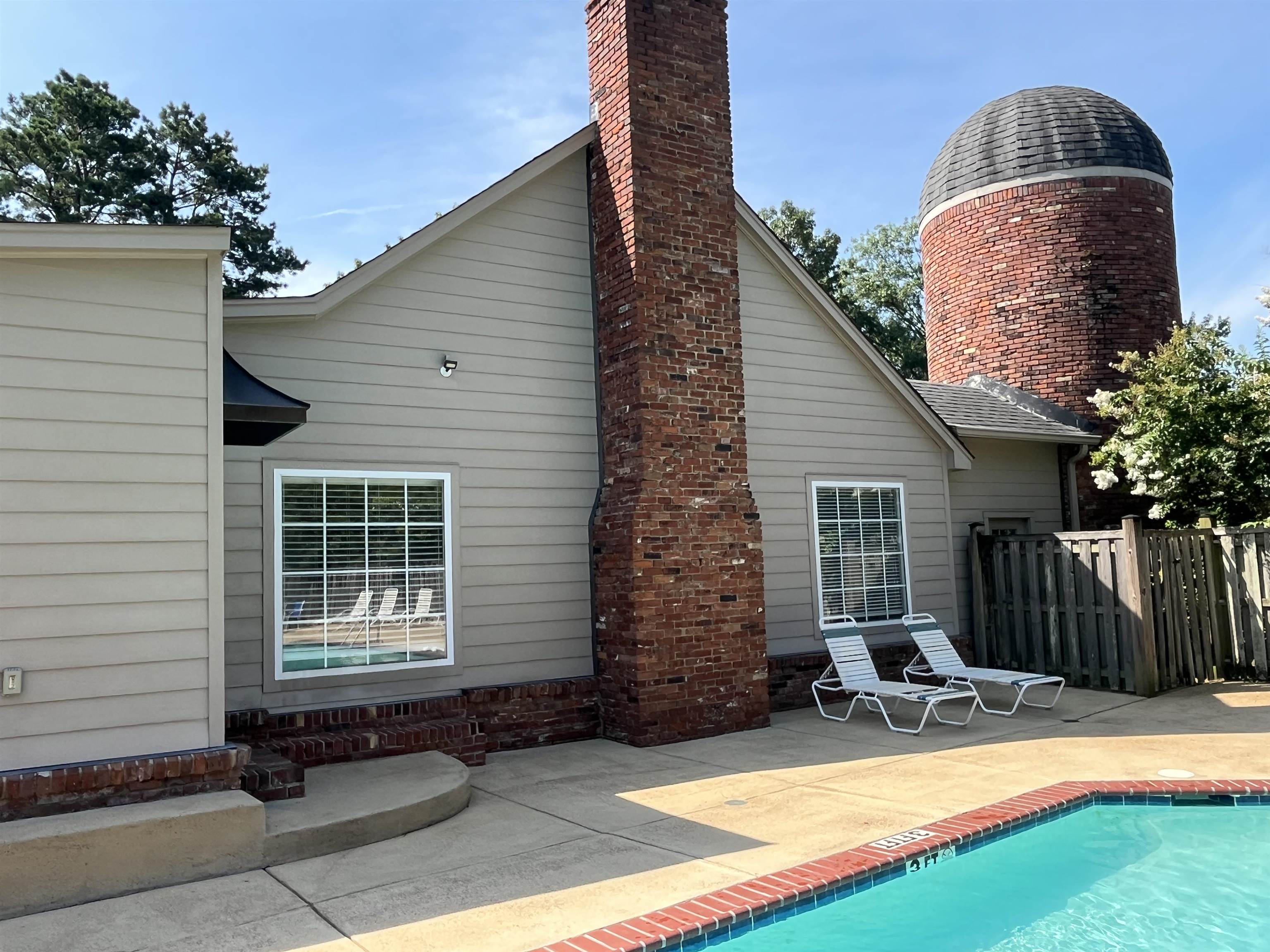 6960 Country Road Germantown, TN 38138 - Photo 29 of 36 a view of backyard with a lounge chair
