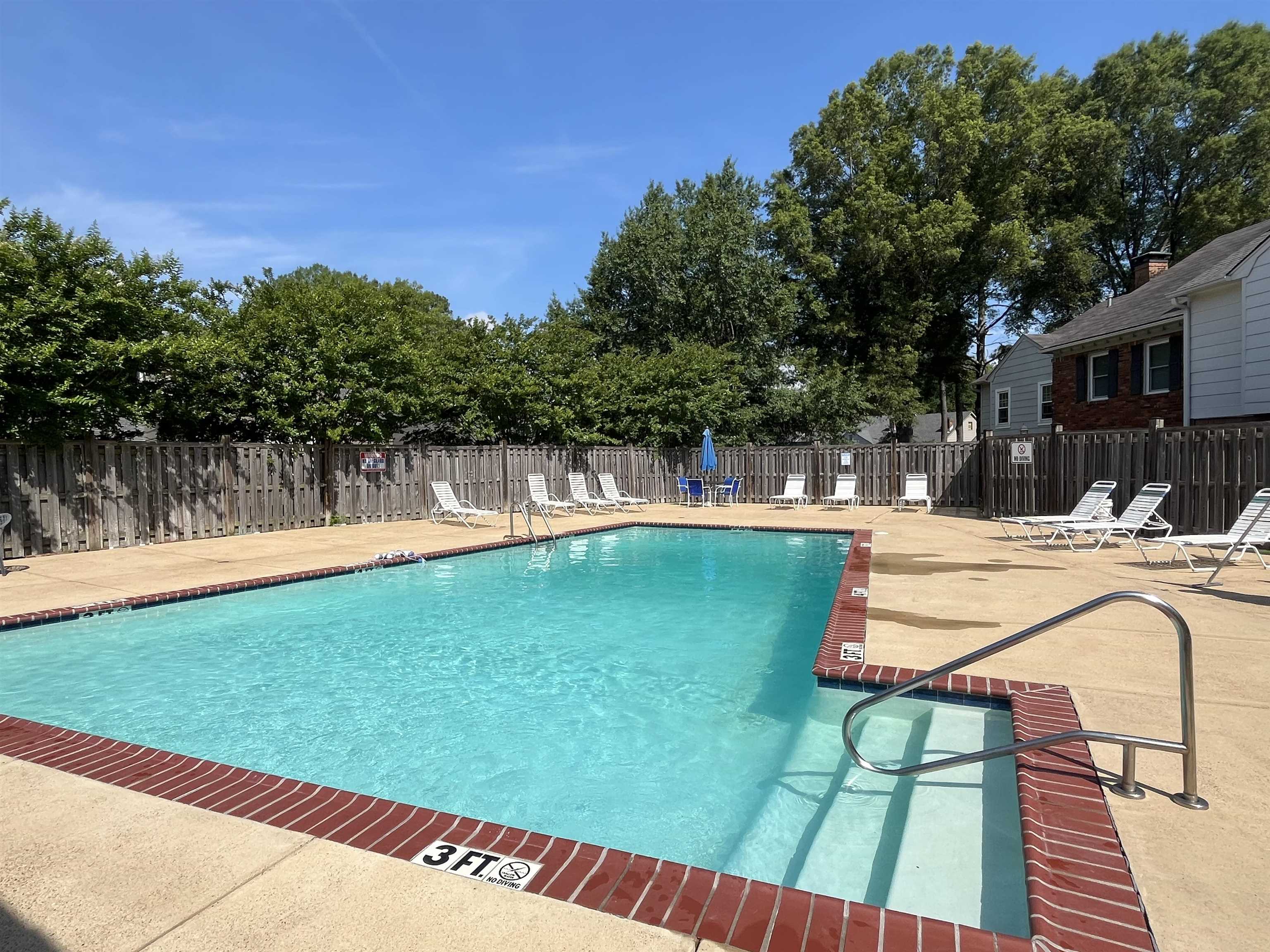 6960 Country Road Germantown, TN 38138 - Photo 8 of 36 a view of a swimming pool with a patio