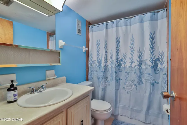 a view of city with tall buildings