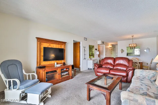 a view of a balcony with chairs