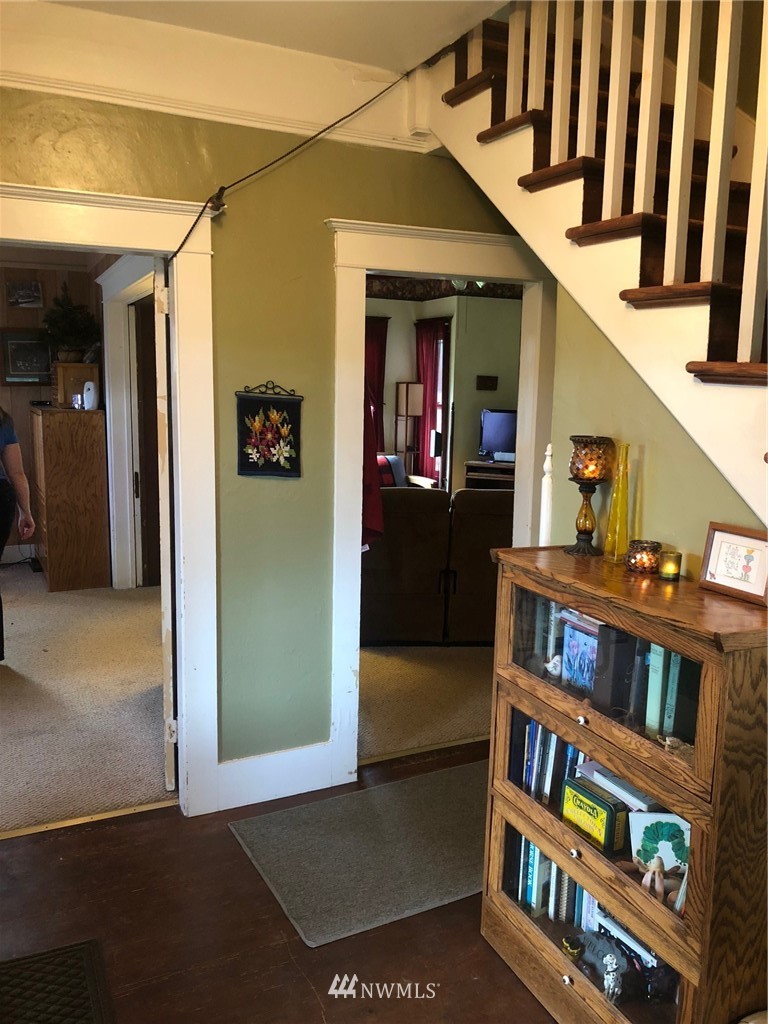 14720 Center Road Quilcene, WA 98376 - Photo 14 of 23 a view of living room with furniture and book shelf