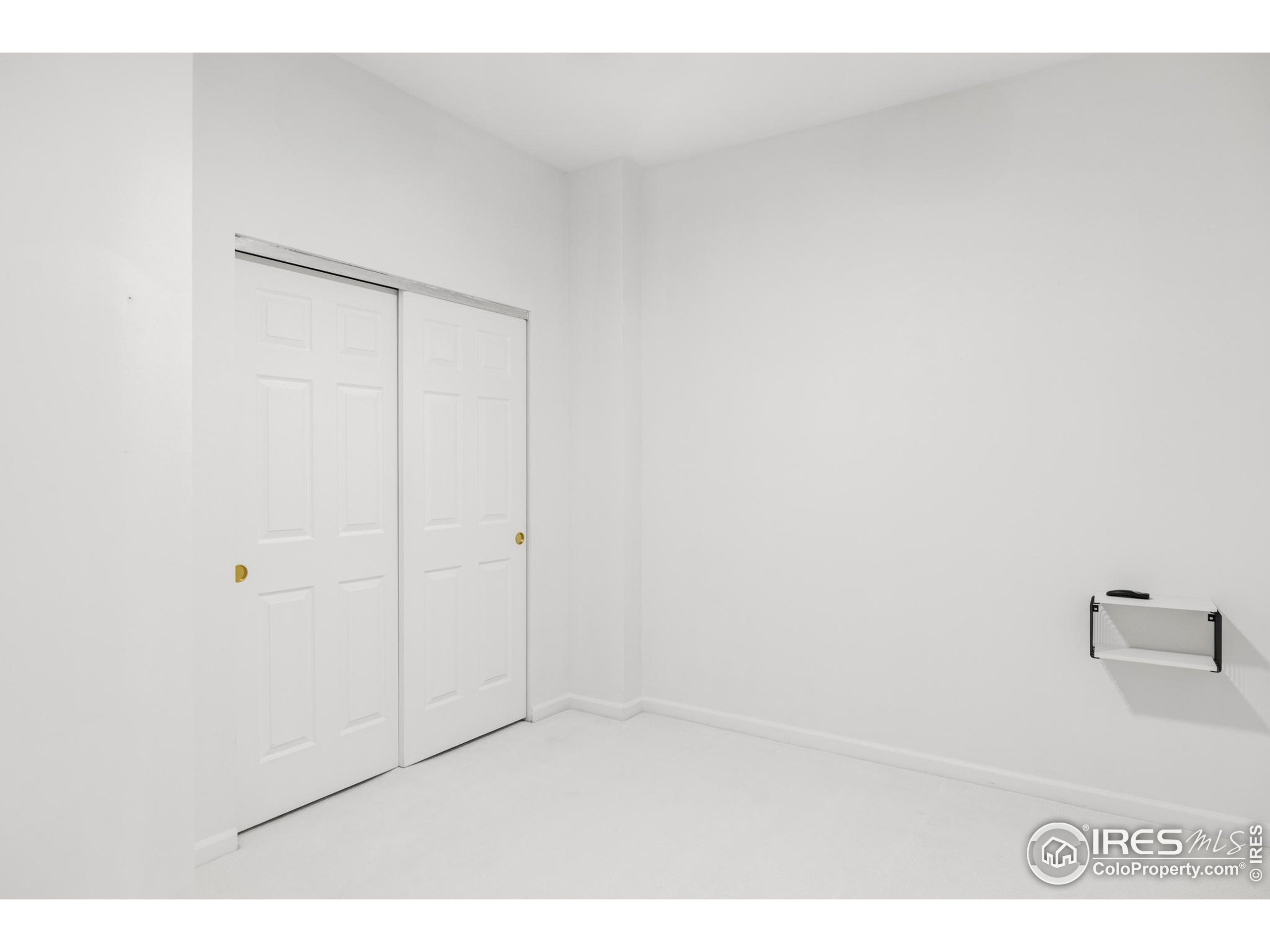 1950 Logan Street, Unit 1013 Denver, CO 80203 - Photo 21 of 23 a view of an empty room