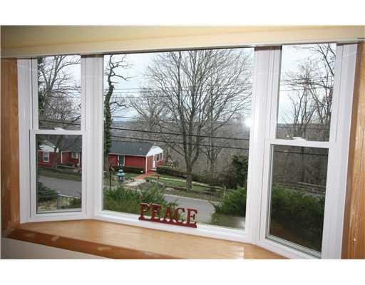 125 Edgecliff Road Rosslyn Farms, PA 15106 - Photo 4 of 18 Living Room. The Living room Bay window provides a nice view out to the next hill top (Crafton/Foster Plaza/downtown Pittsburgh).