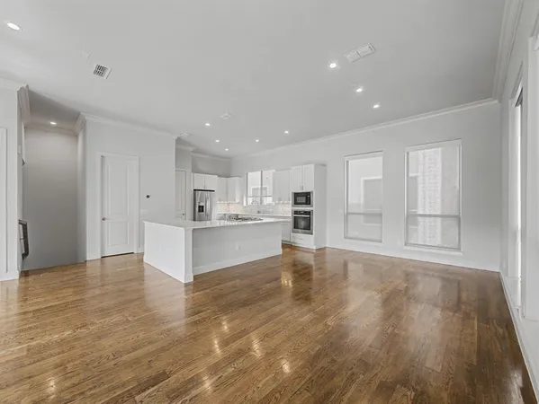 a view of kitchen with wooden floor