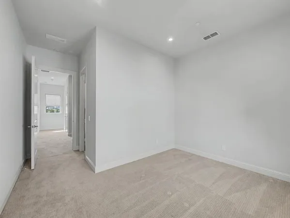 a bathroom with a shower sink and mirror
