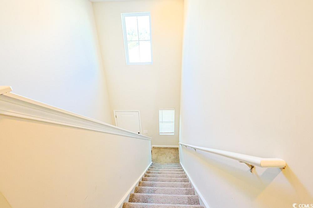 1560 Swing Bridge Way Myrtle Beach, SC 29588 - Photo 15 of 35 Stairway with carpet floors and baseboards