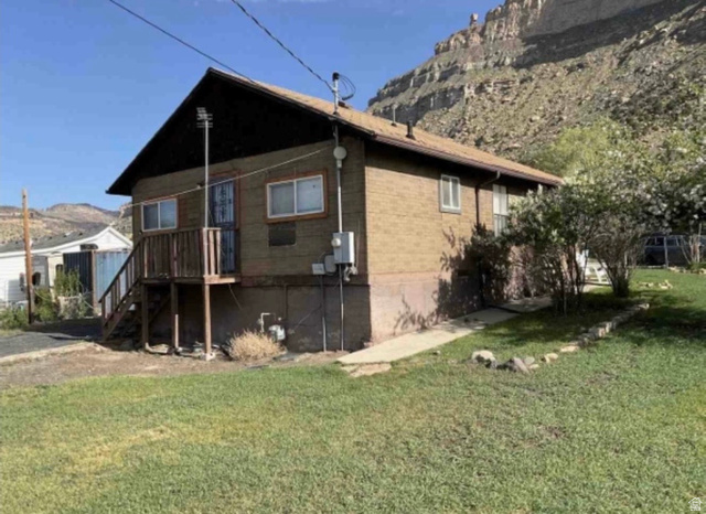 46 East E Street Helper, UT 84526 - Photo 26 of 27 Photo of rear of home during Summer