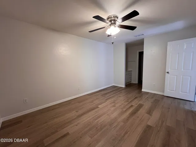 a view of a room with racks on the wall