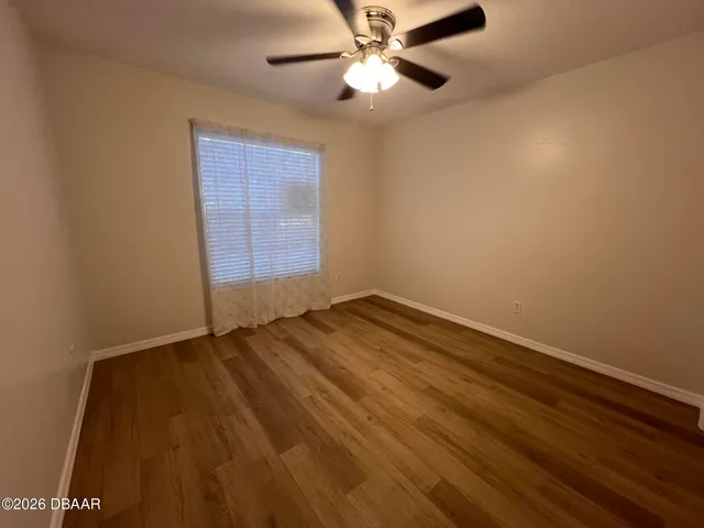 a bathroom with a toilet and a view