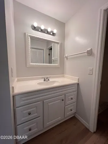 a view of a swimming pool with a patio and swimming pool