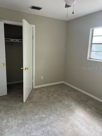 an empty room with closet