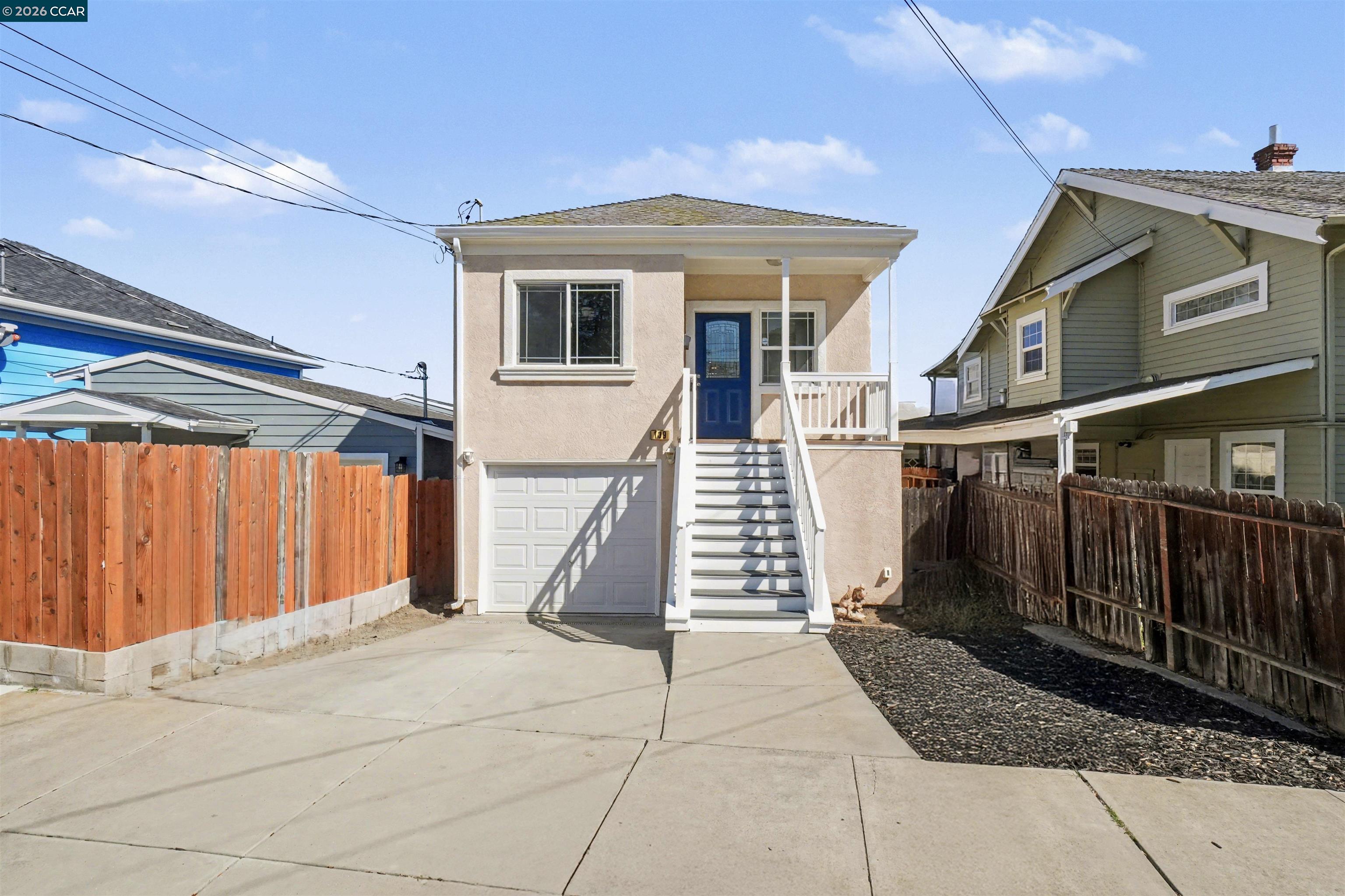 139 Rodeo Avenue Rodeo, CA 94572 - Photo 1 of 19 a front view of a house with a garage