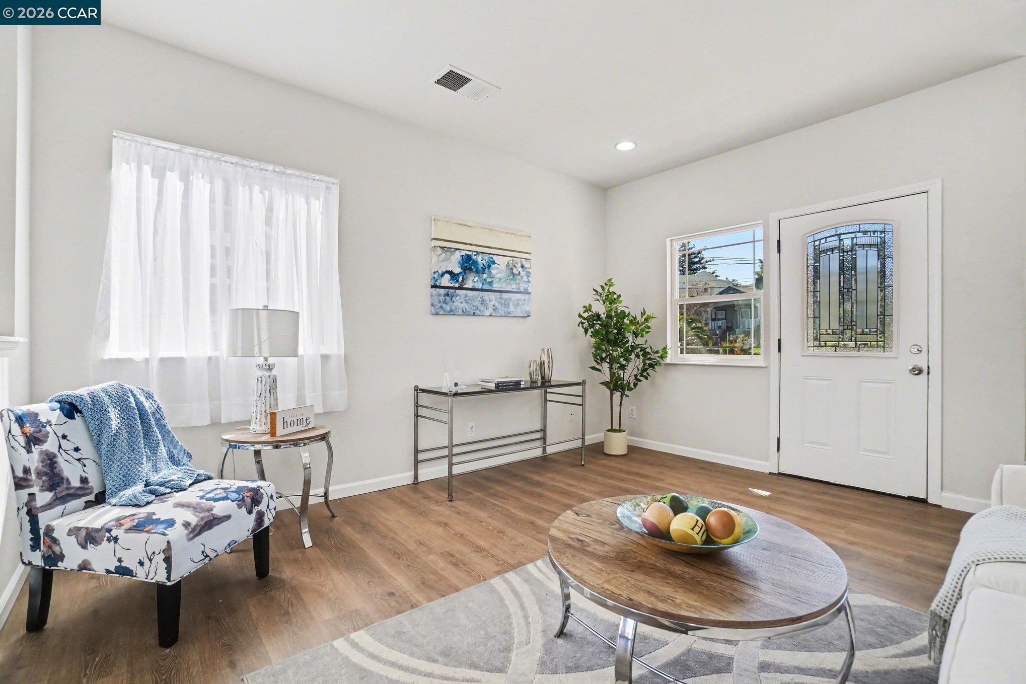 139 Rodeo Avenue Rodeo, CA 94572 - Photo 4 of 19 a living room with furniture and wooden floor