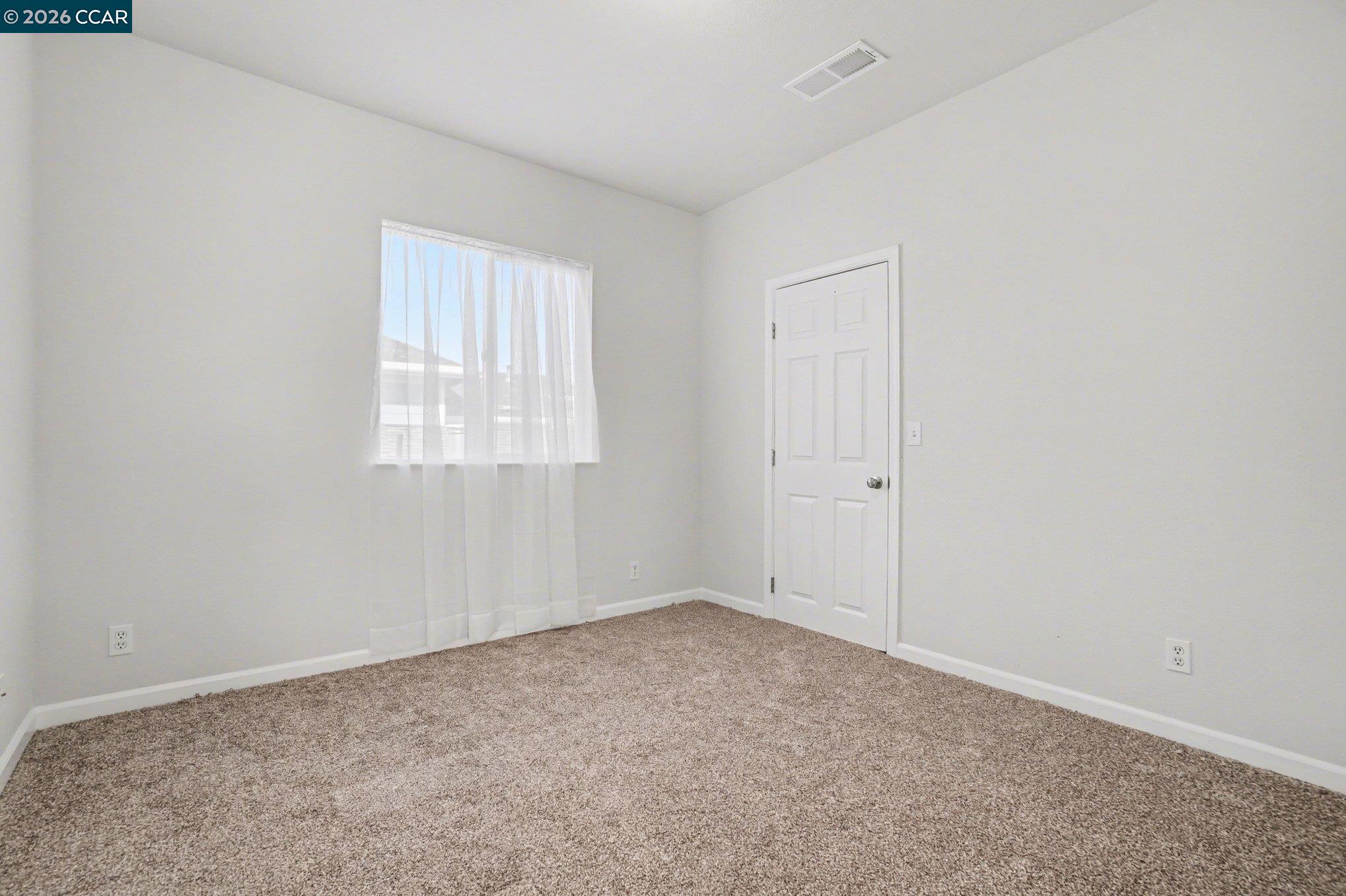 139 Rodeo Avenue Rodeo, CA 94572 - Photo 8 of 19 an empty room with a window